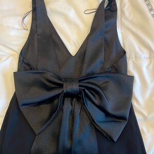 Zara backless cocktail dress with a Beautiful
Bow tie in back. Size S.